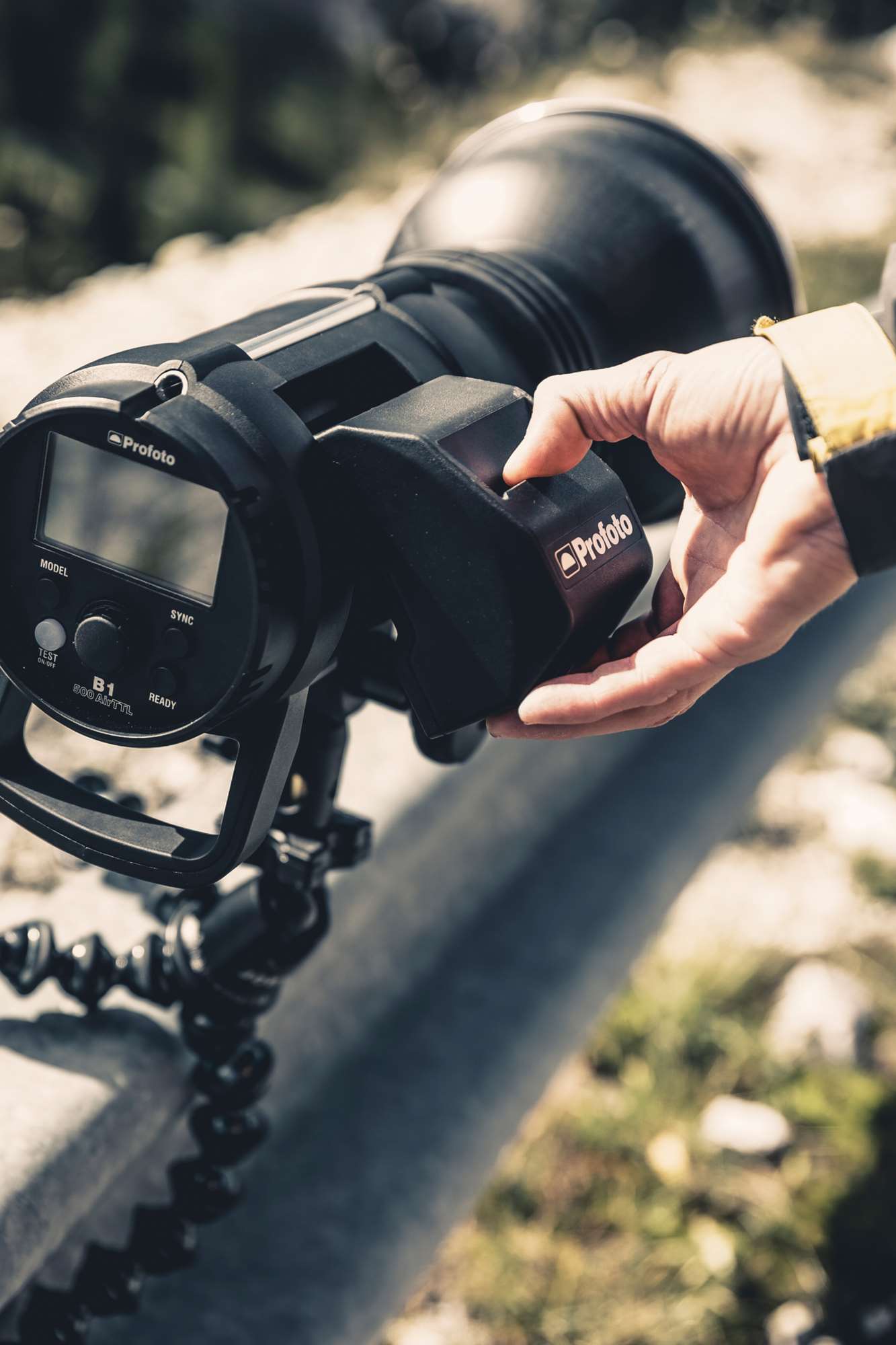 Profoto B1X & B1 Li-Ion Battery MkII being inserted into a Profoto B1.