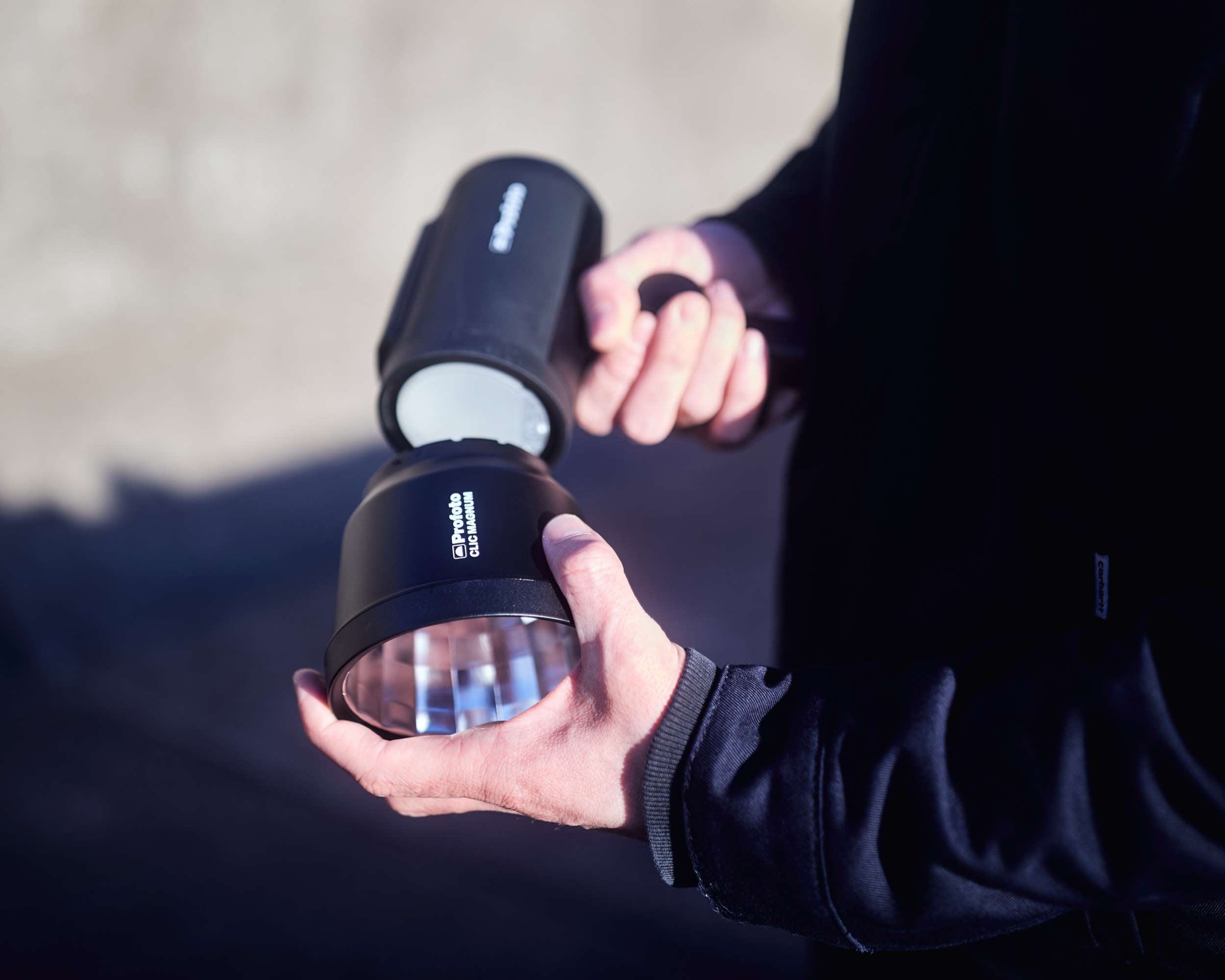 Profoto Clic Magnum being attached to a light.