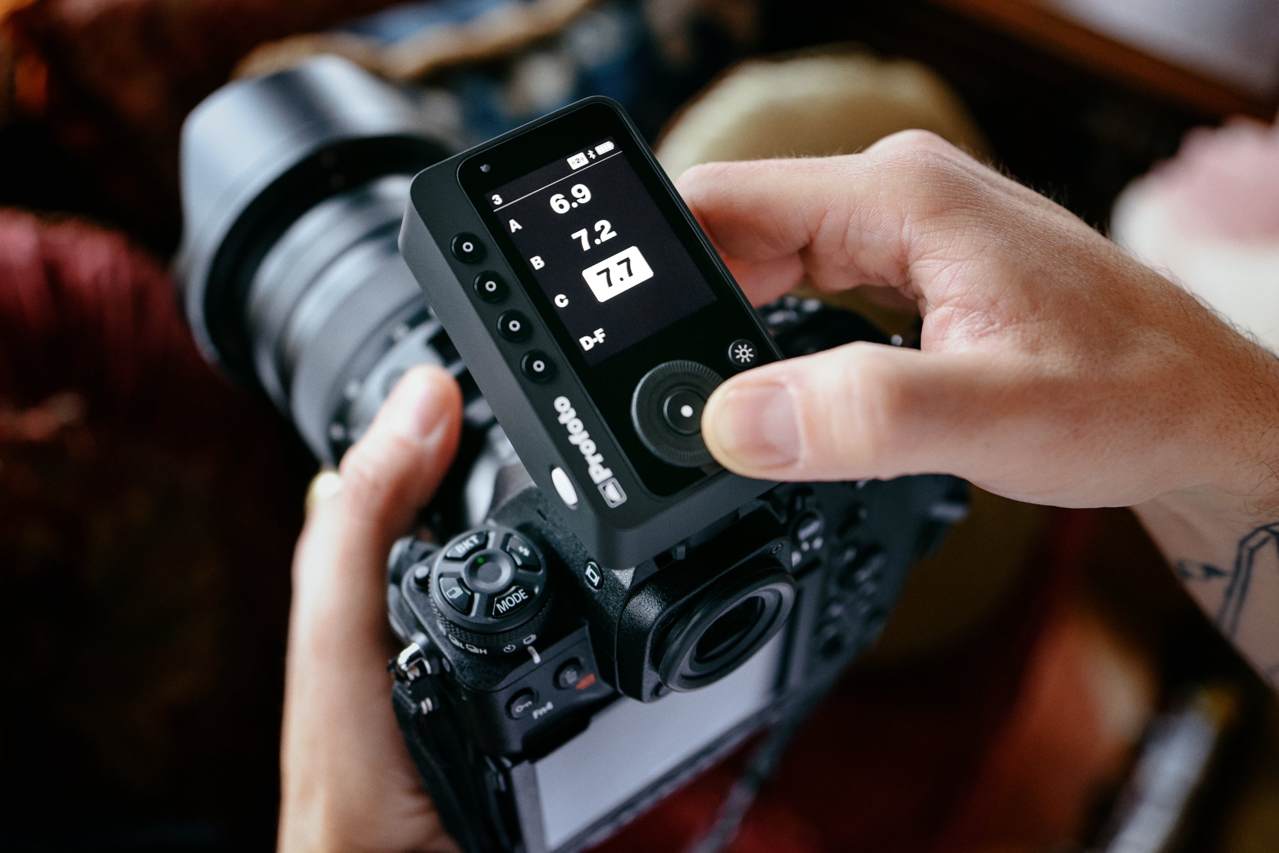 Profoto Connect Pro for Canon being altered whilst on top of a camera.