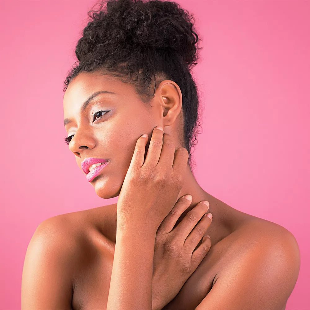 Portrait of a female model being photographed utilising a Savage Ruby Seamless Background.