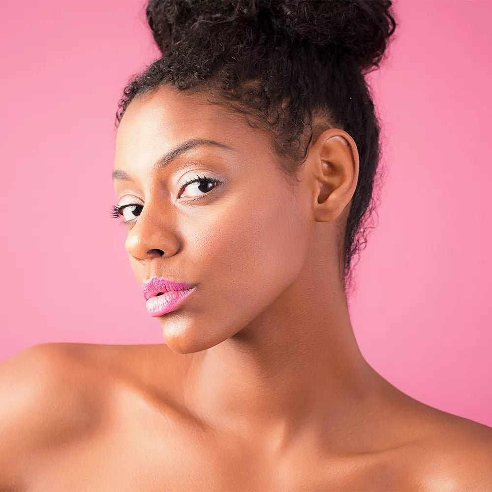Portrait of a female model pictured utilising a Savage Ruby Background.