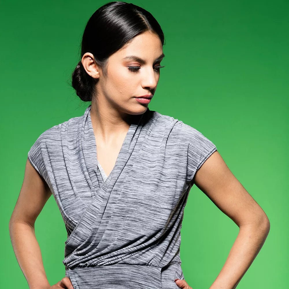 Savage Tech Green Seamless Background being utilised on shoot with a female model.