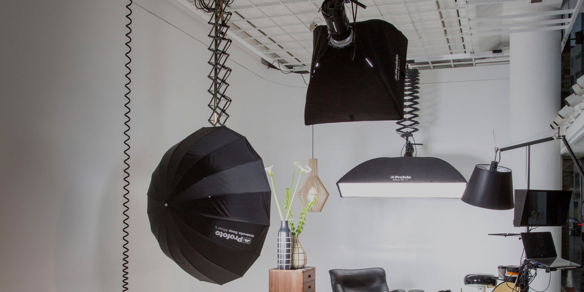 Photo lighting setup on HiGlide ceiling track system in an infinity cove.