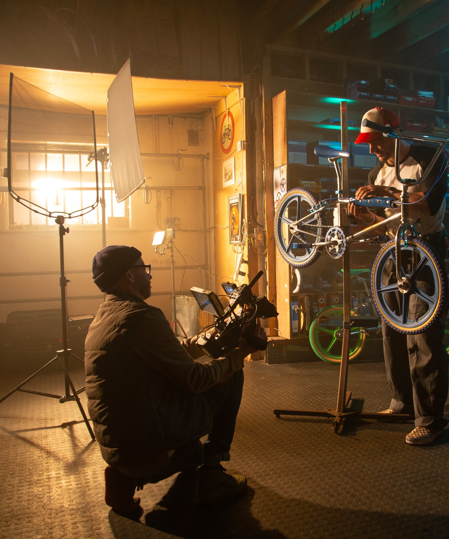 Manfrotto Flag Kit in use in a bike studio, with filmning in process