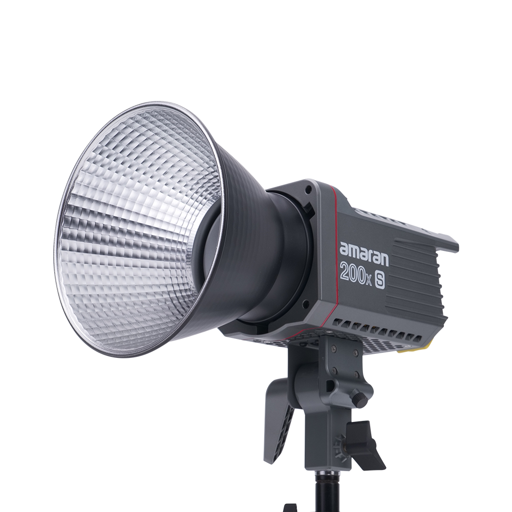 Side View of Amaran 200x S with a Bowens mount hyper reflector attached on a transparent background. 