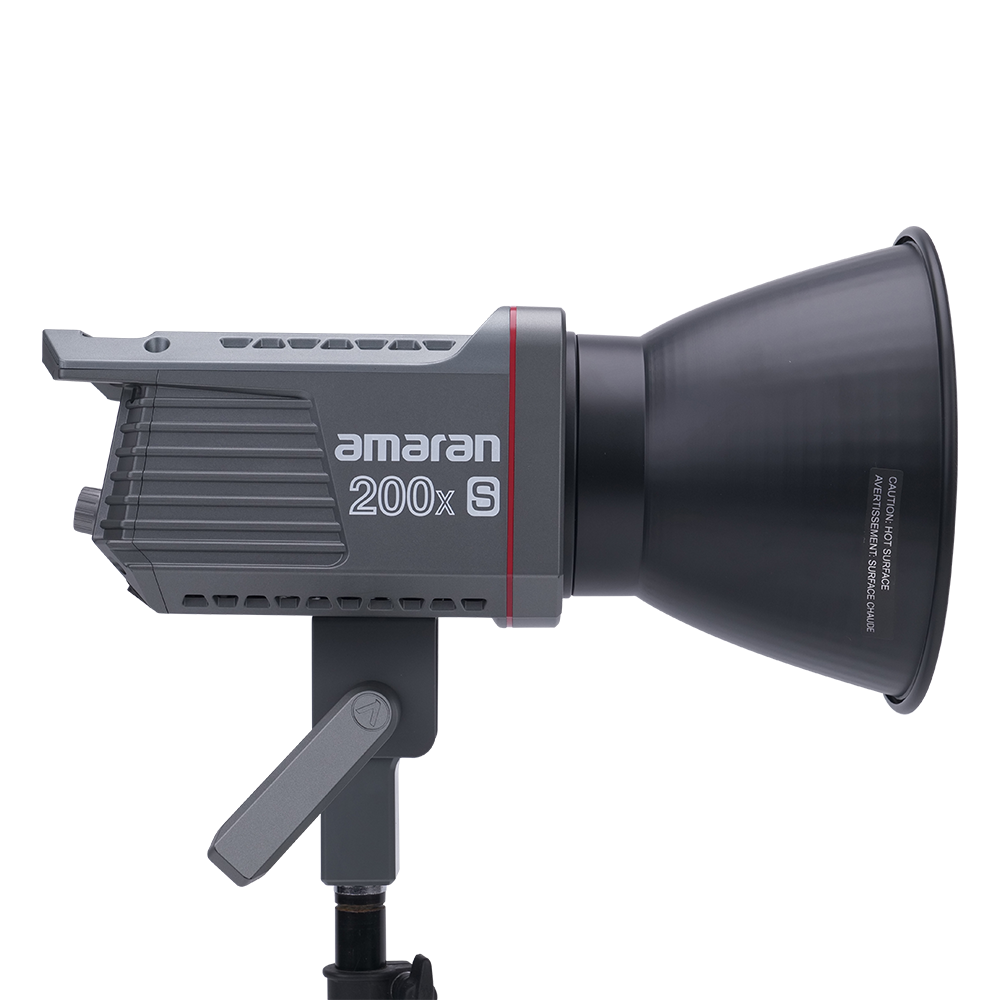 Side View of Amaran 200x S with a Bowens mount hyper reflector attached on a transparent background. 