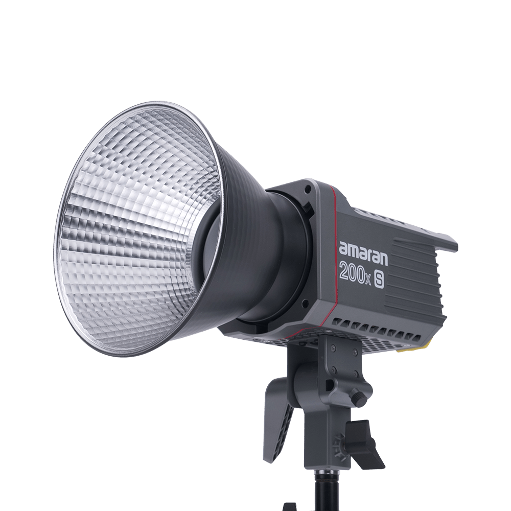 Side View of Amaran 200x S with a Bowens mount hyper reflector attached on a transparent background. 