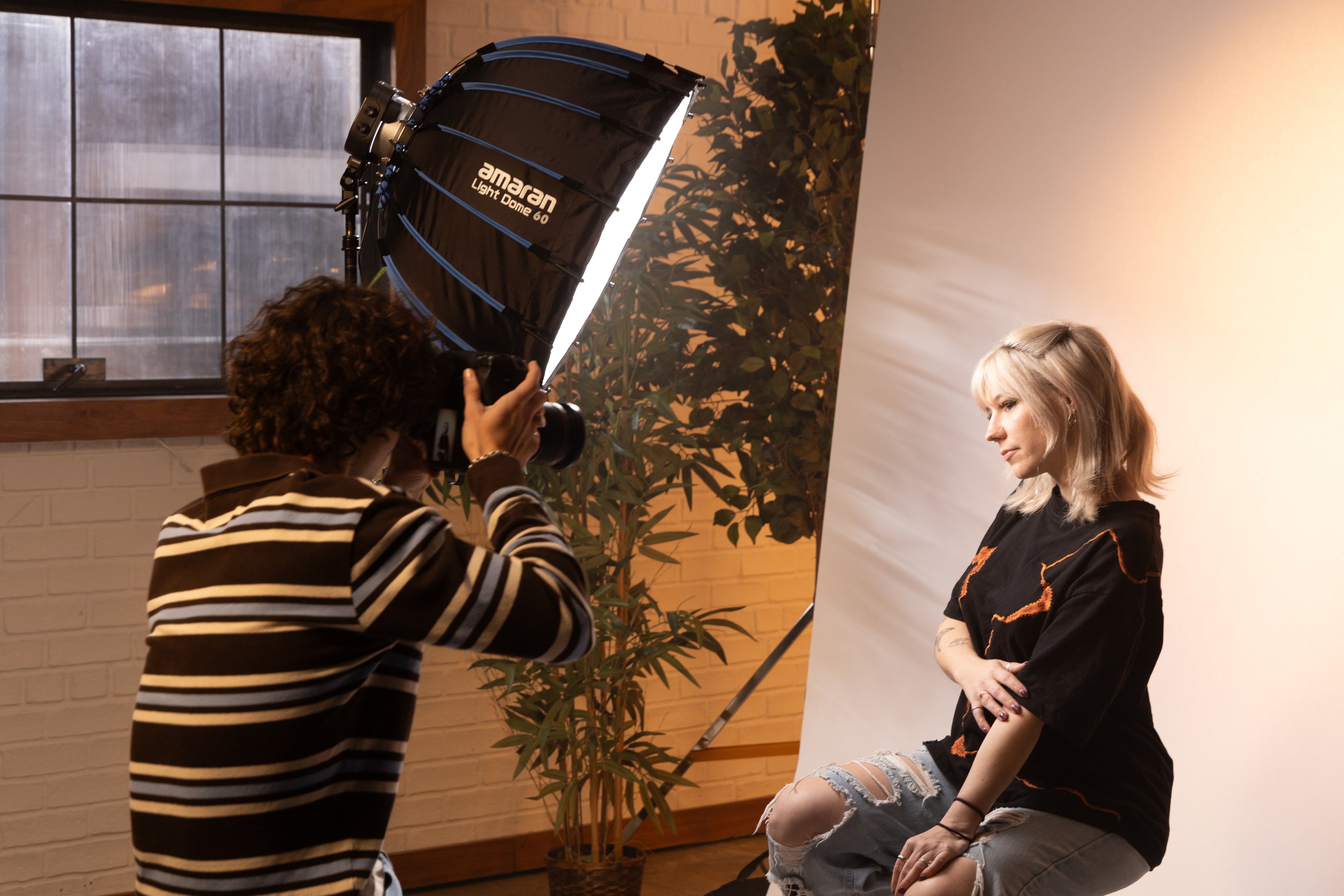 amaran Halo 100x being used in a studio environment with a Light Dome 60 softbox connected.