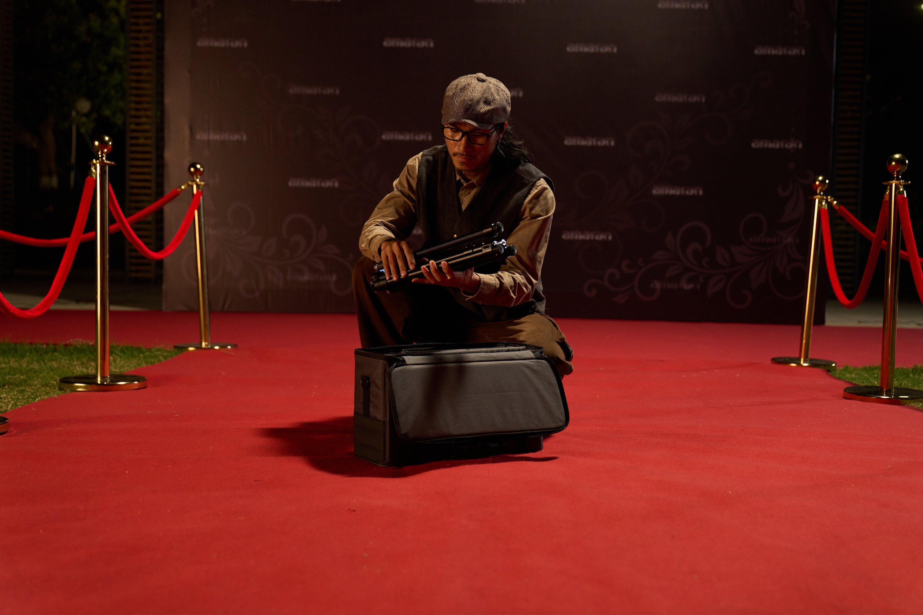 Person packing away the amaran Pano 60c Light Kit into its case.