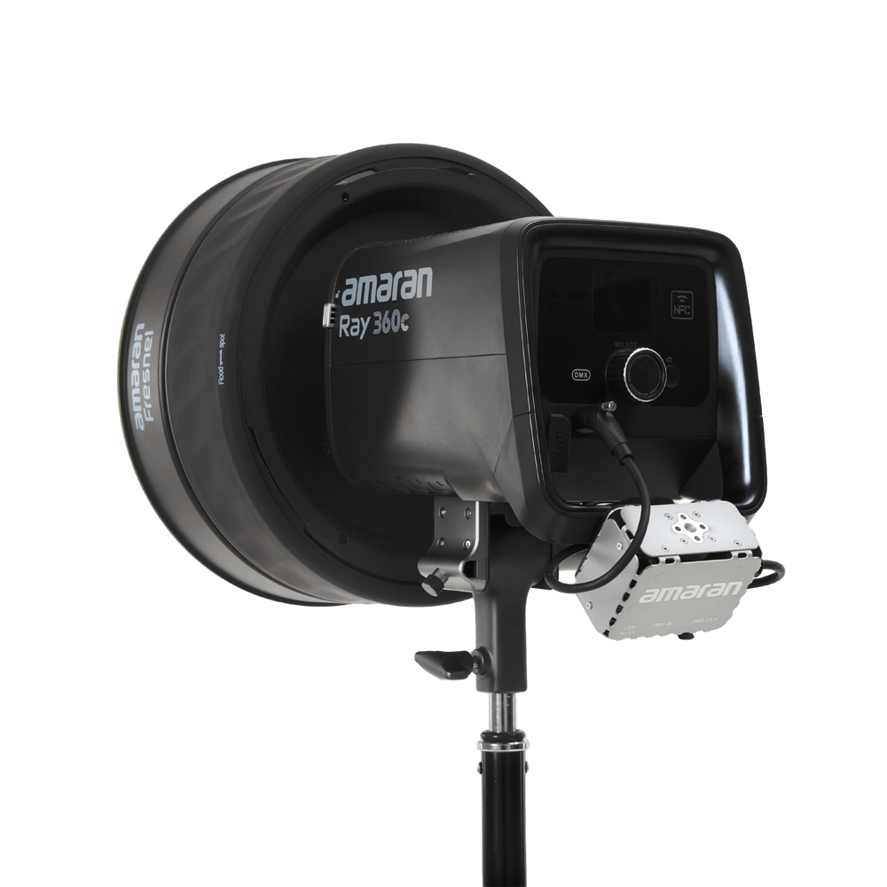 amaran USB-C to 5-Pin DMX In & Out Adapter attached to a light fixture.