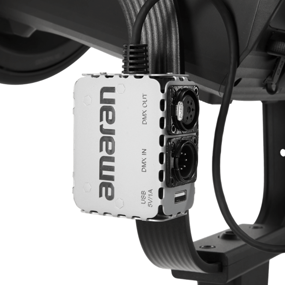 amaran USB-C to 5-Pin DMX In & Out Adapter attached to a light fixture.