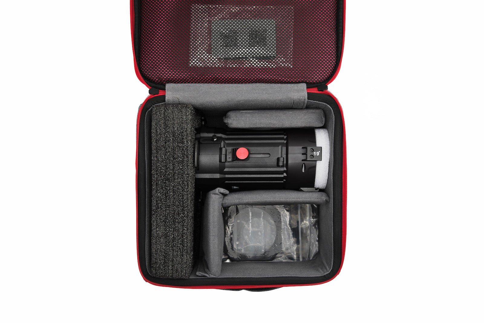 Aputure Spotlight Mini Kit with 19° Lens for Storm 80C in its protective carry case.