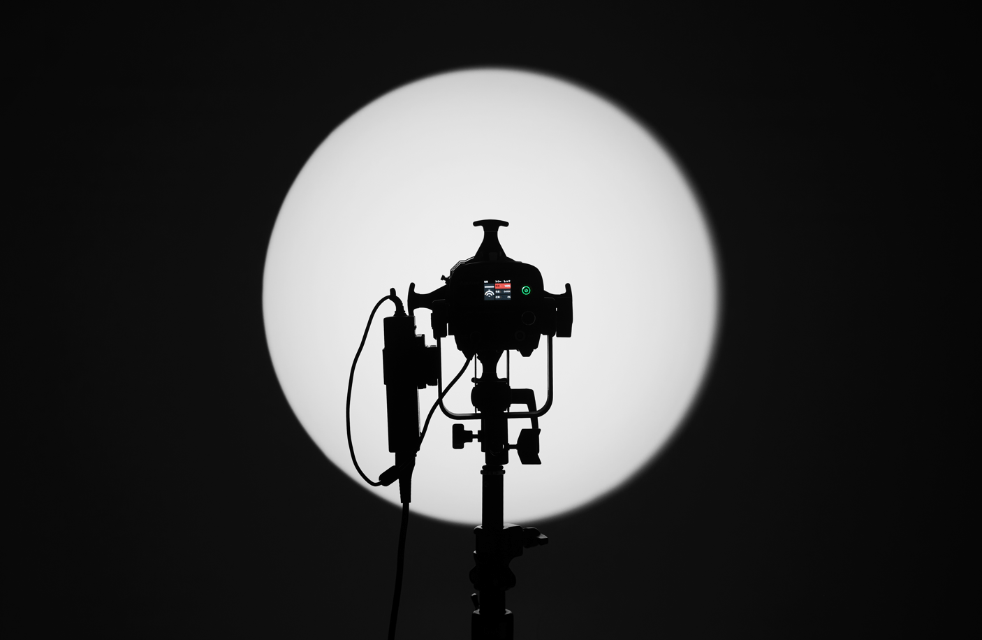 Aputure Spotlight Mini Kit with 36° Lens in use on a location photoshoot.