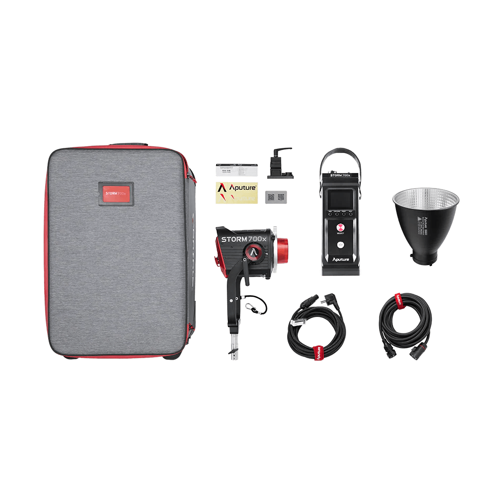 Aputure 700x UK kit with case, fixture, ballast, cables and reflectors on a transparent background. 