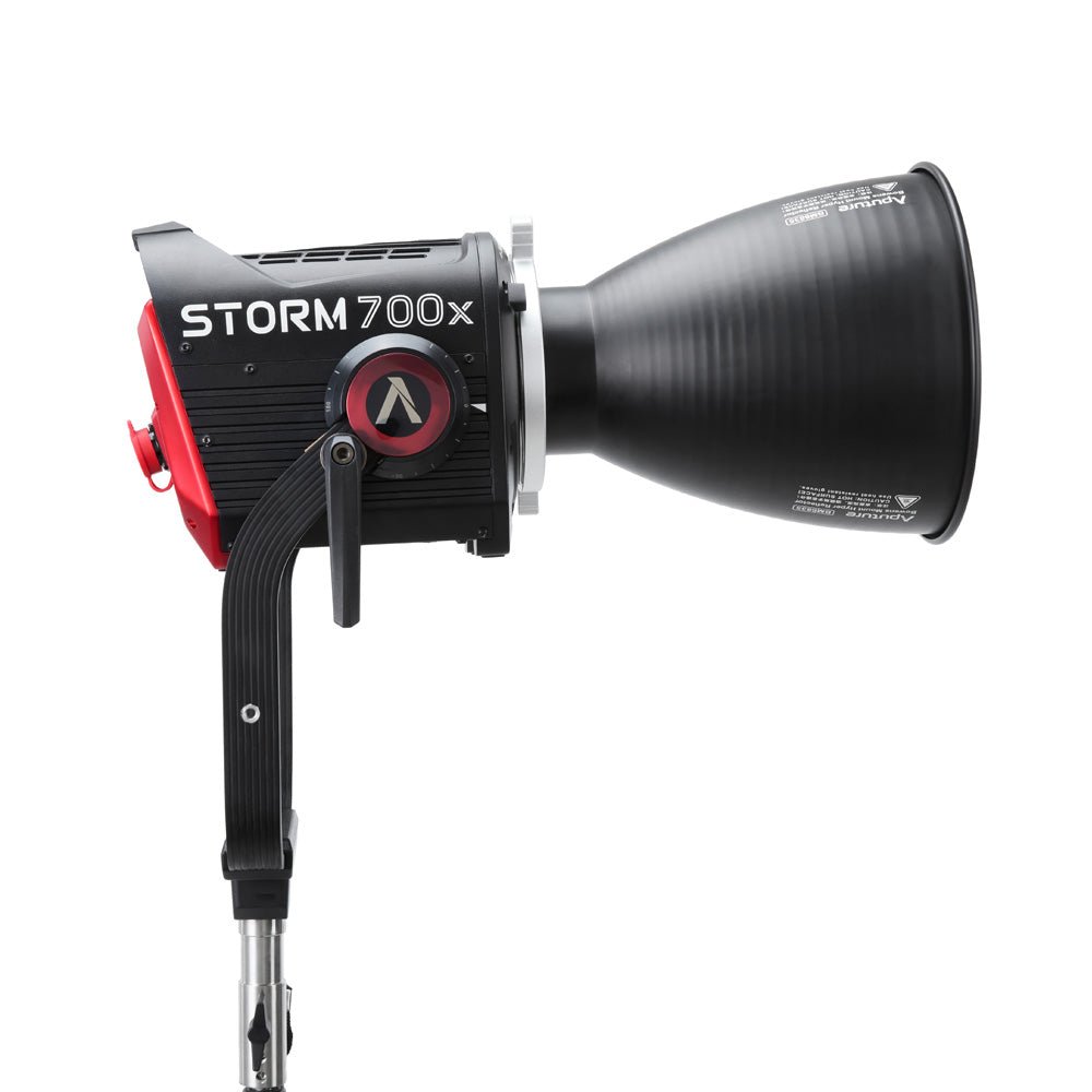 Side view of Aputure STORM 700x with reflector connected.