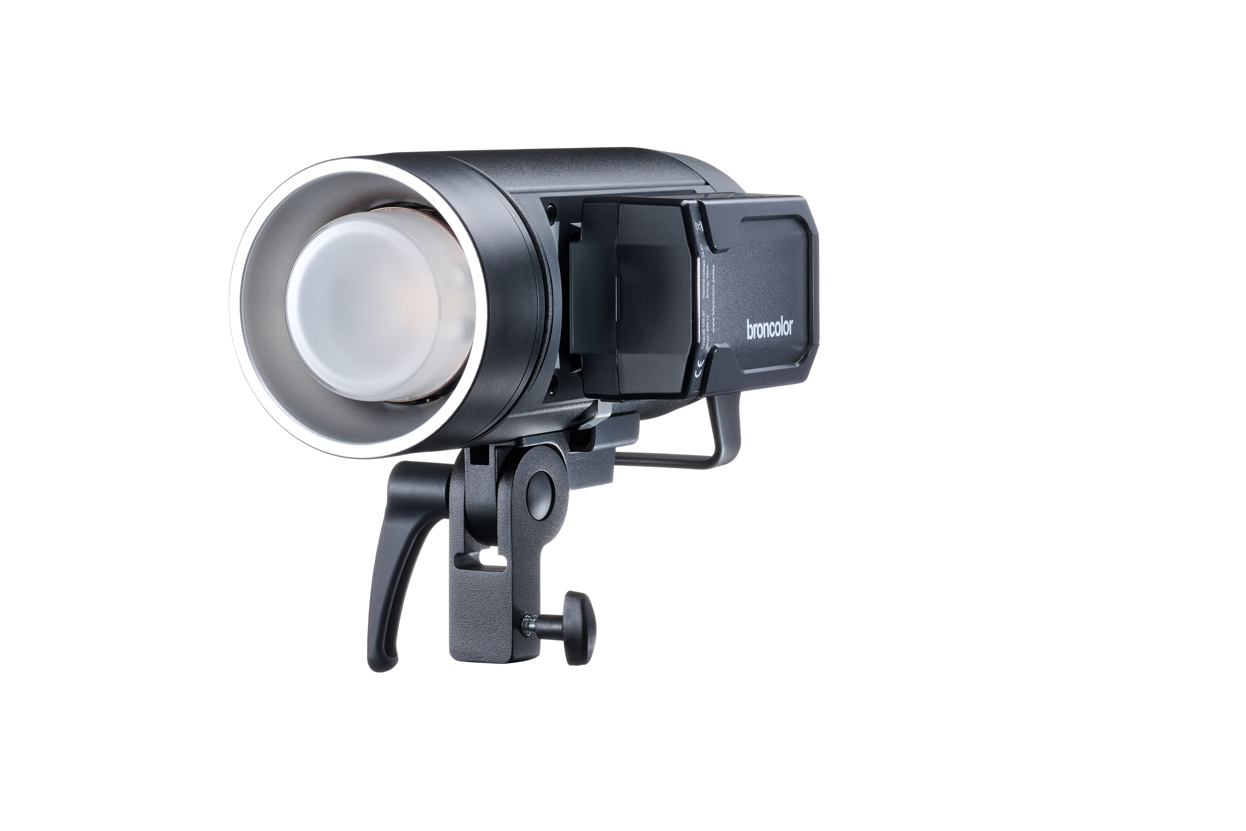 Front 3/4 view of the Broncolor Stelos 800 L Monolight with V-Mount battery visible on the side.