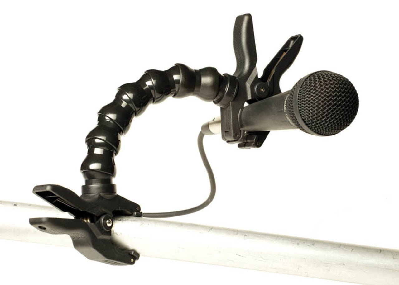 Versatility of Dinkum Clamp to Clamp (1" to 2") shown with it being used as microphone holder and grip.