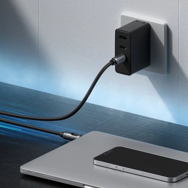 HAGiBiS 240W Fast Charging Cable plugged into the wall and into a laptop.