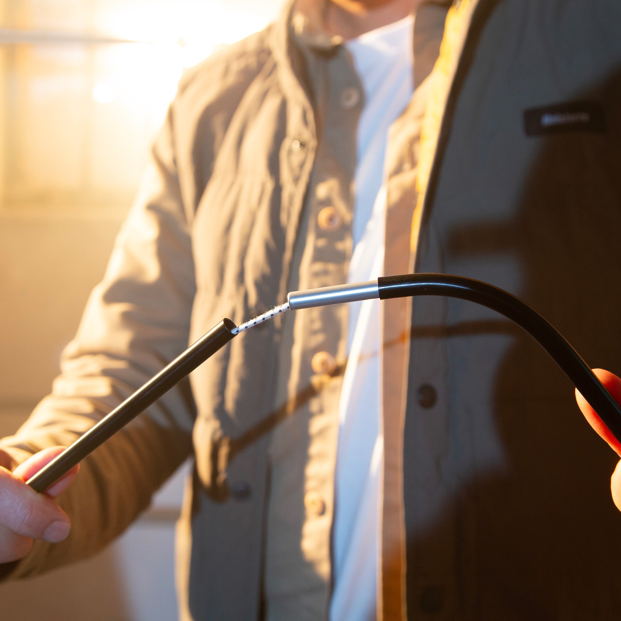 A lighting technician setting up the Rapid flag frame.