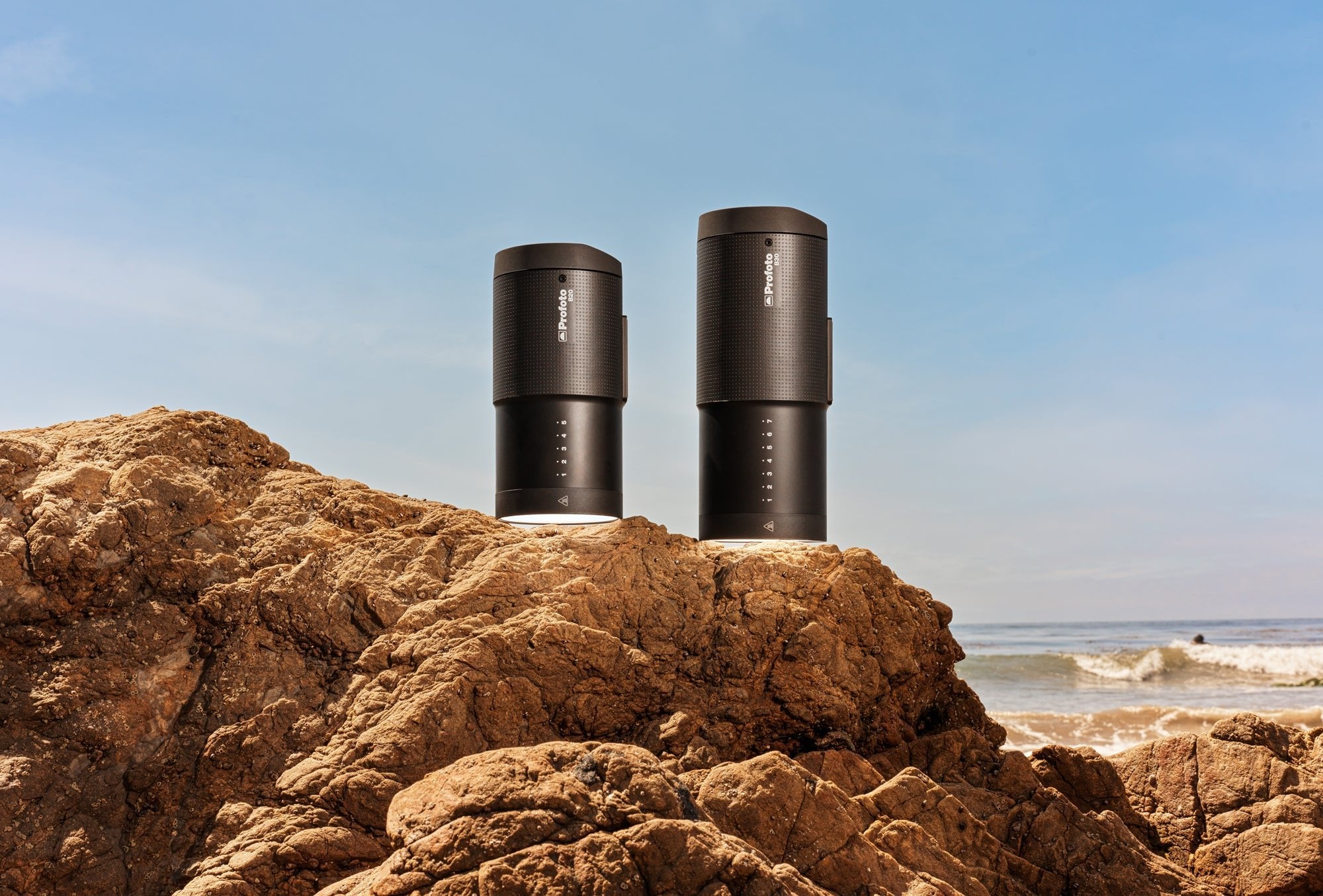 Profoto B20 and B30 on a beach rocky background. 