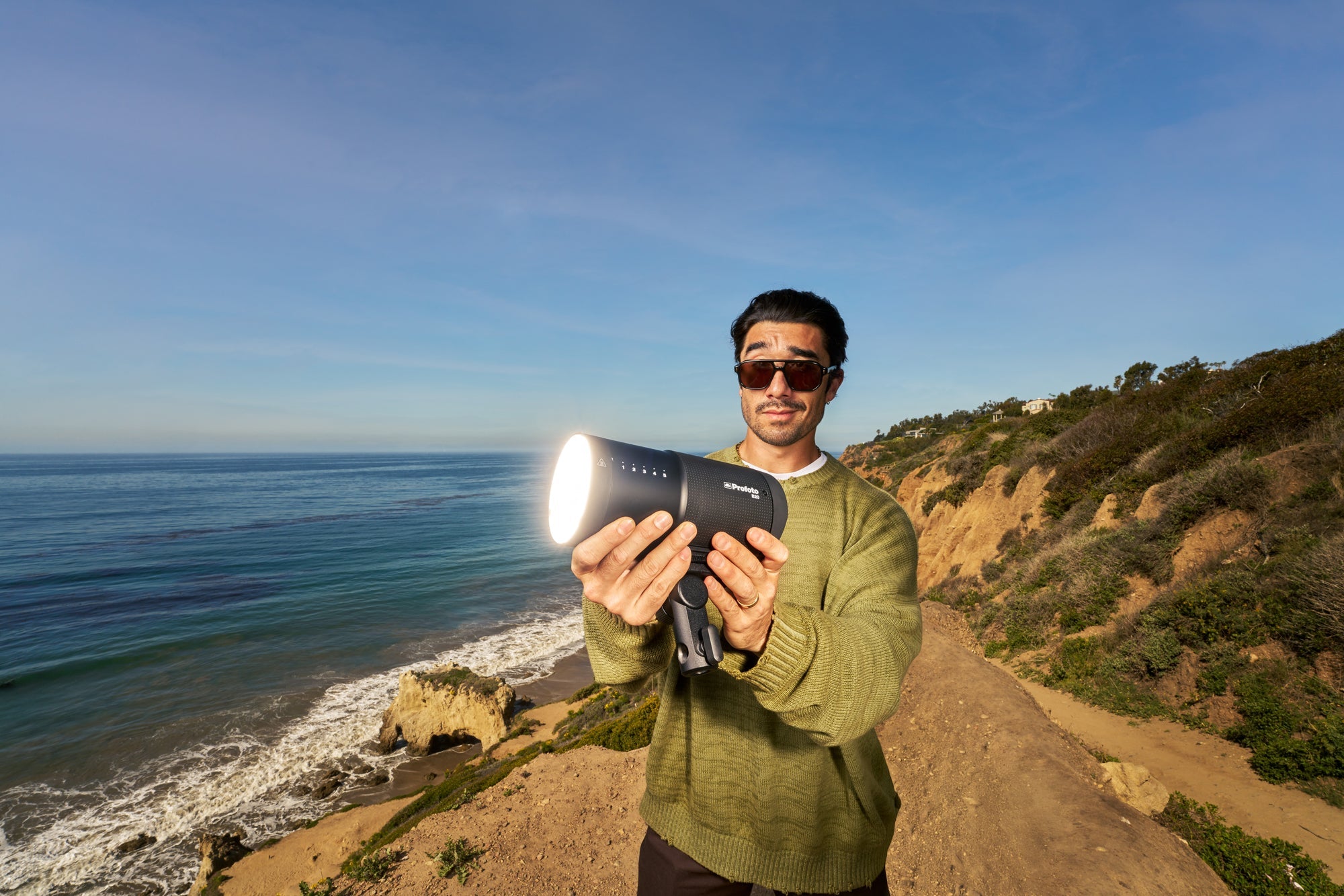 Profoto Evan Tanaka hero image with sea scape in the background. 