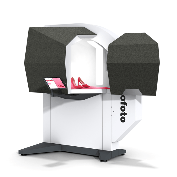 Doors open on the Profoto Eclipse II with a pink background inside and high heels being photographed.