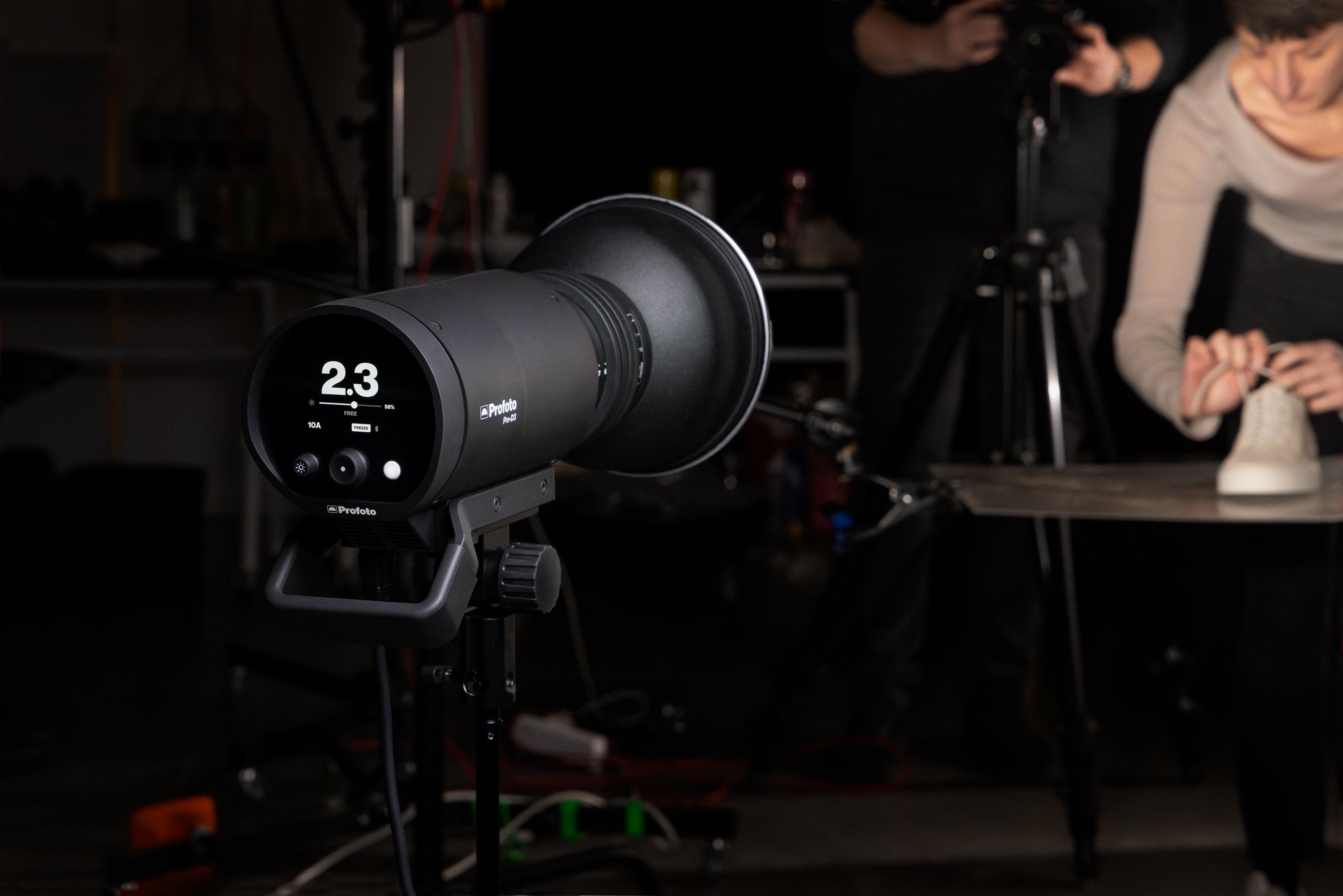 A Profoto Pro-D3 on location and illuminating a model. 