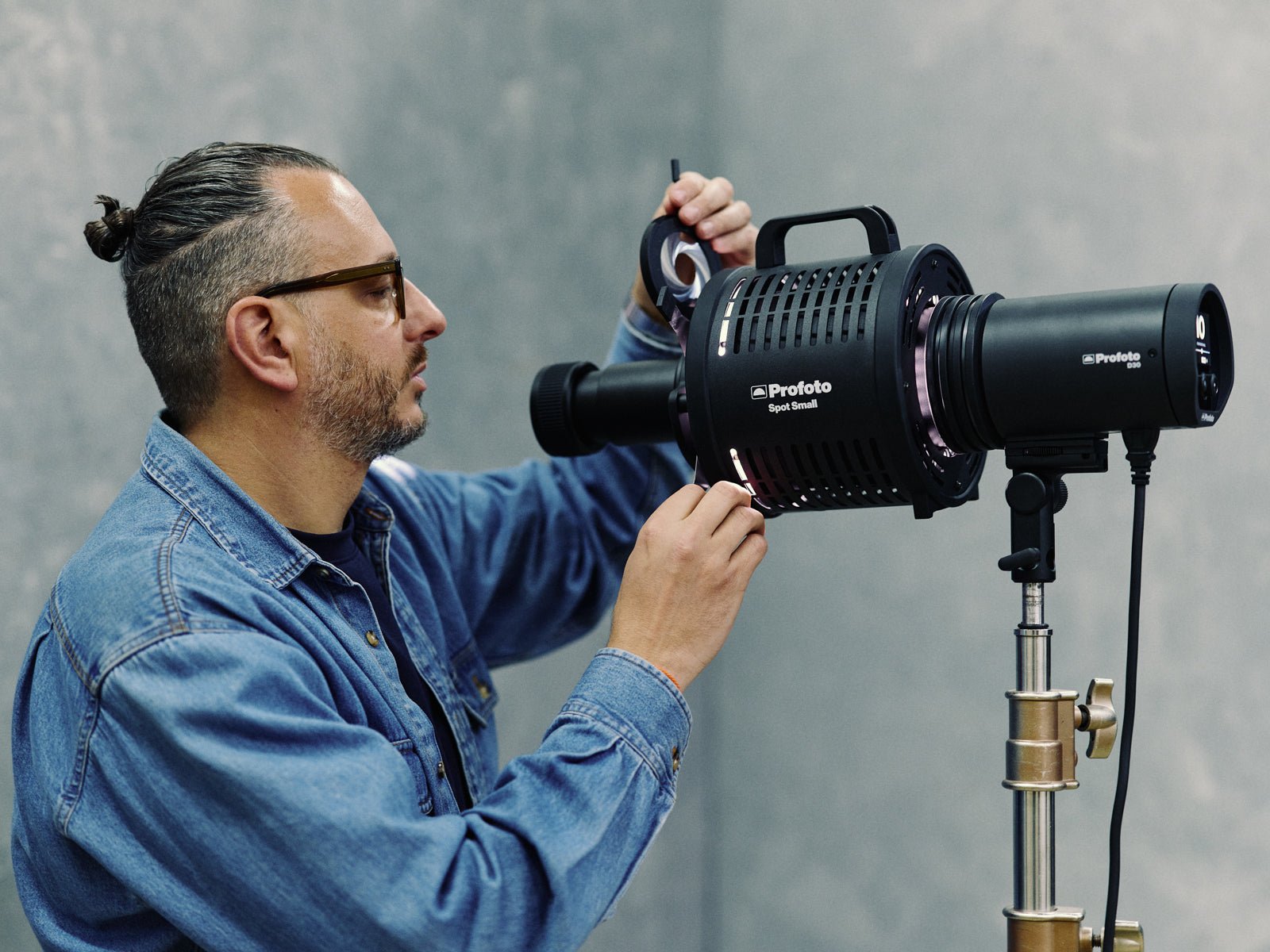 Photographer using the Profoto Spot Small.