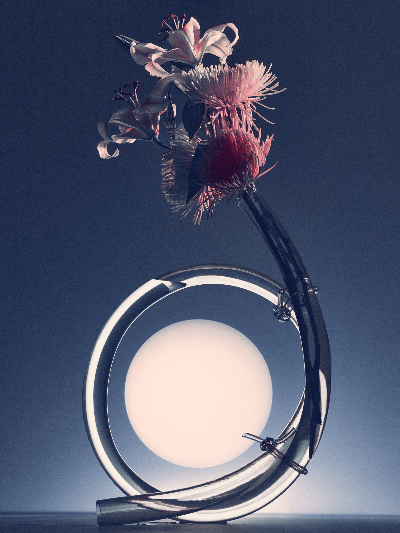 Decorative lamp with floral design on a dark background