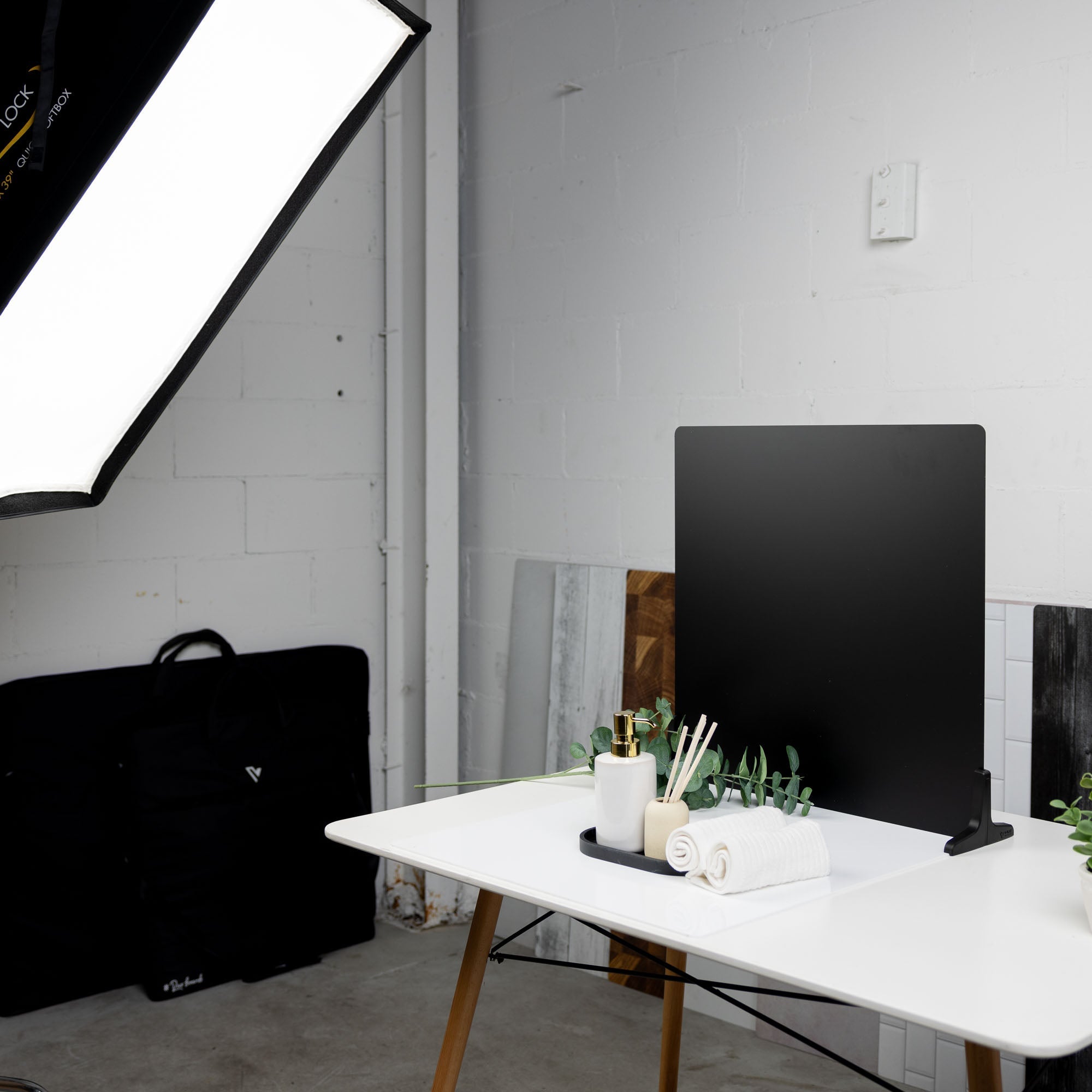 BTS image with the V-Flat Black Gloss/Black Matte Duo Board in use.