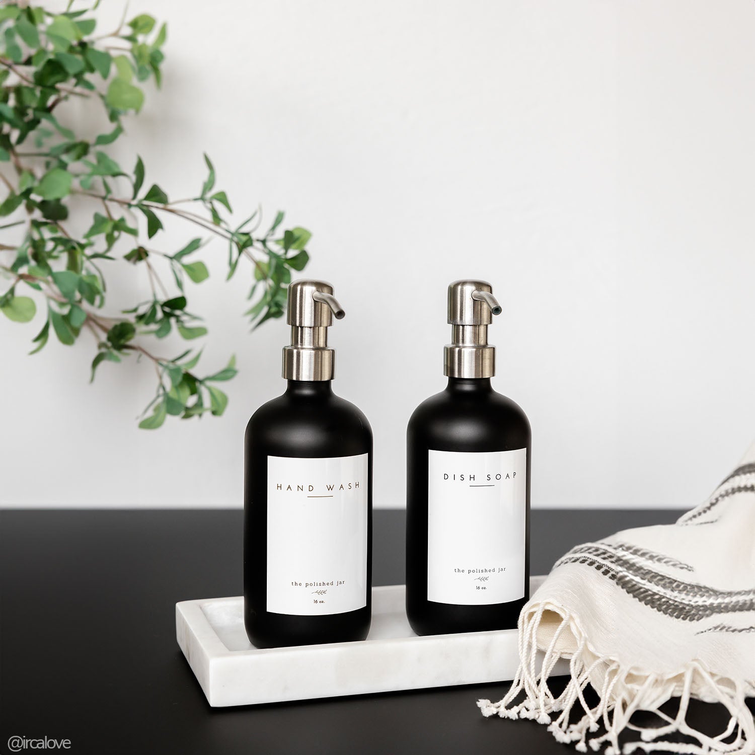 Beauty products being photographed with a V-Flat Black Gloss/Black Matte - XL Duo Board.