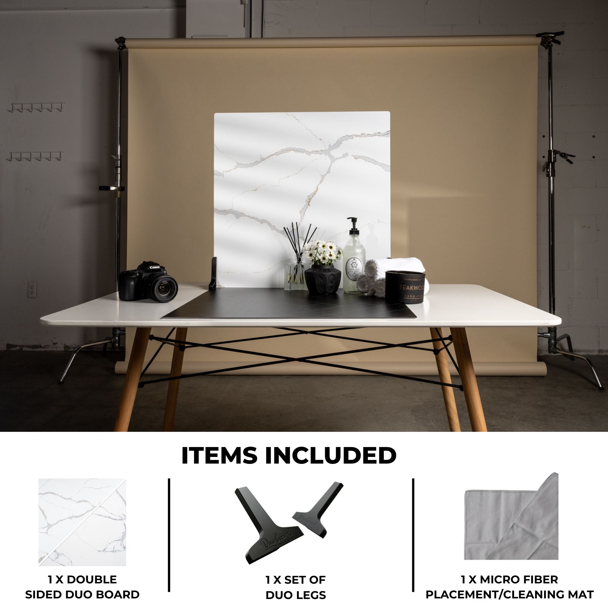 A studio environment utilising the V-Flat Carrara Blue/Calacatta Gold Duo Board on a table.