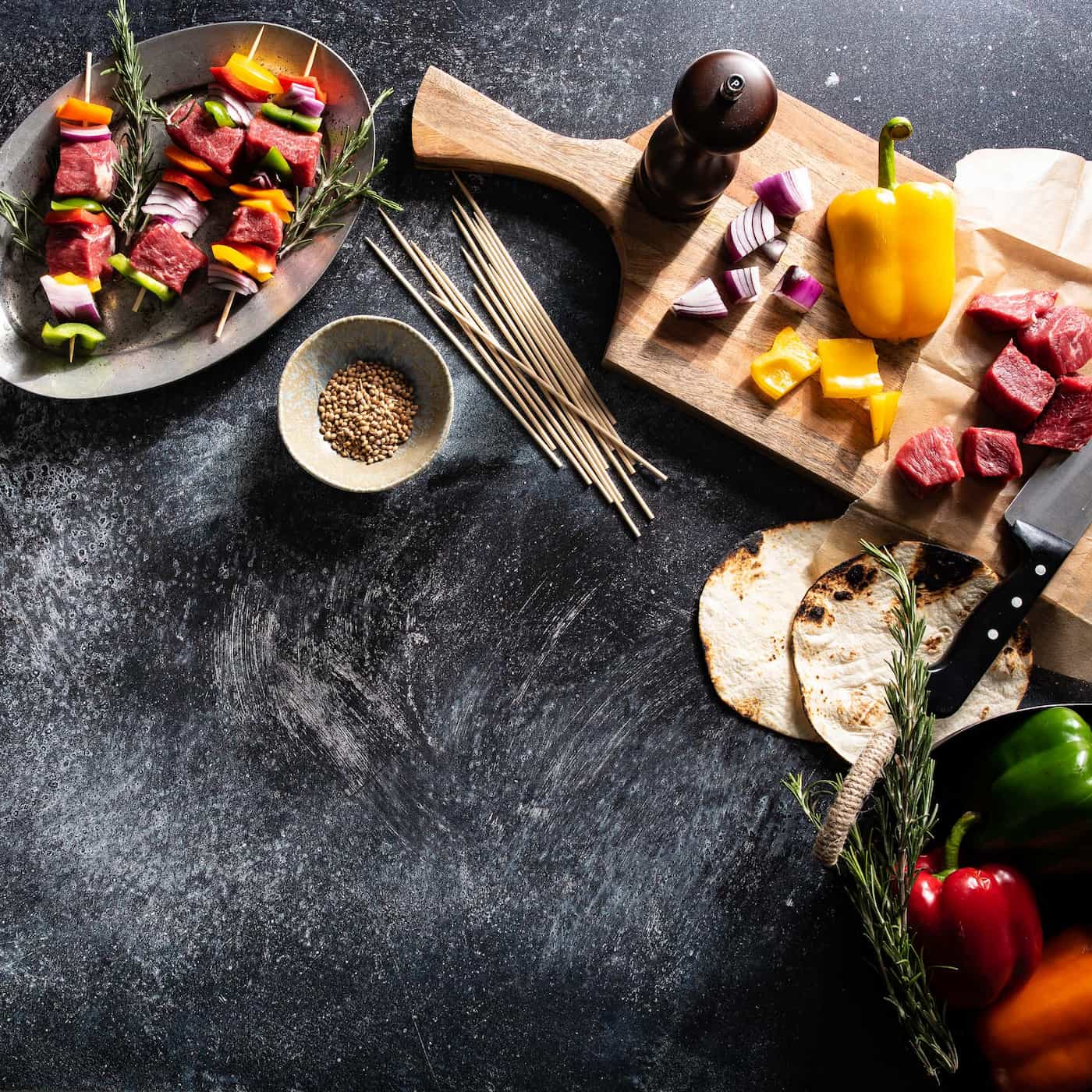 V-Flat Grey Chalk/Dark Chalk Duo Board with assorted food being presented.