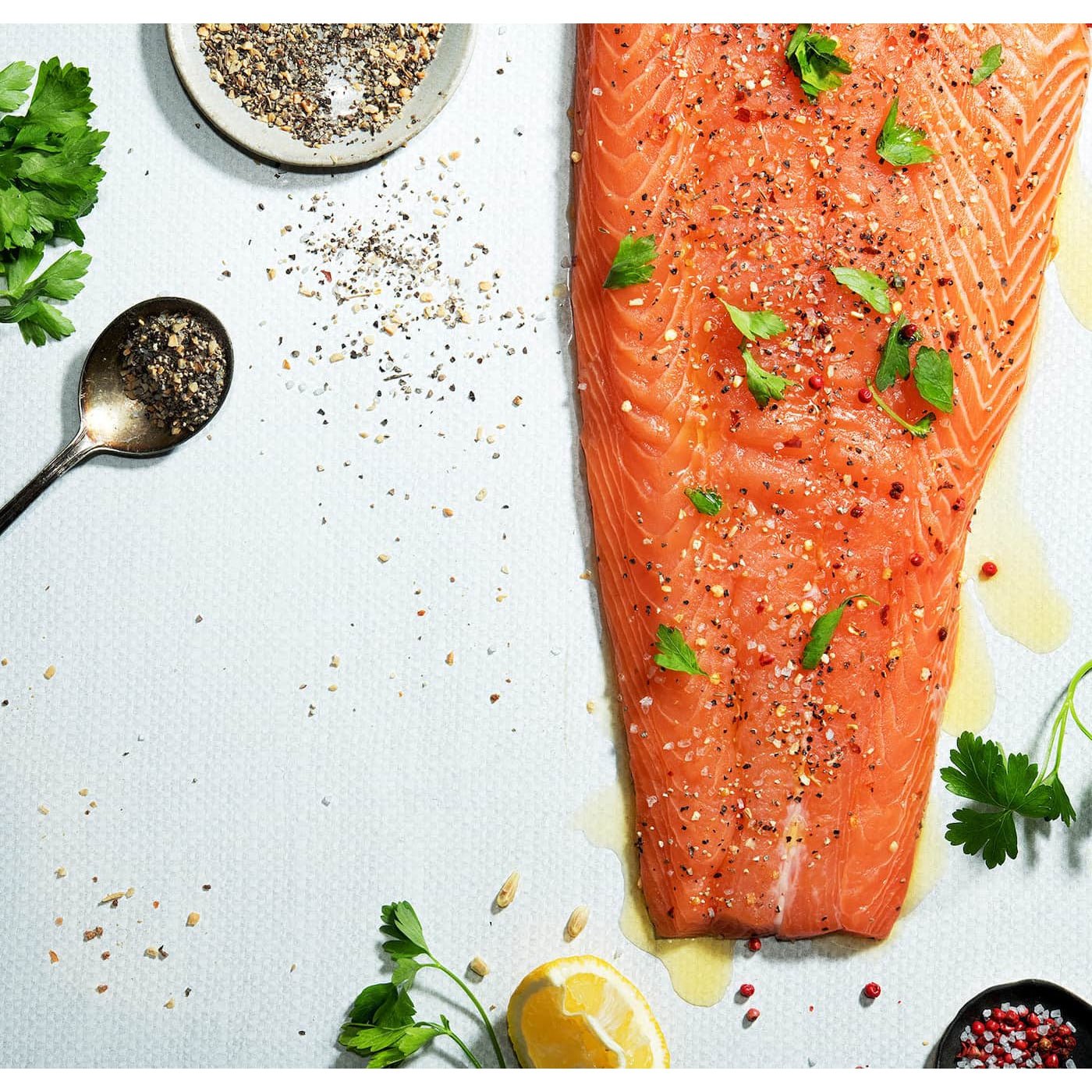 V-Flat Linen White/Linen Cream Duo Board with a fillet of salmon.