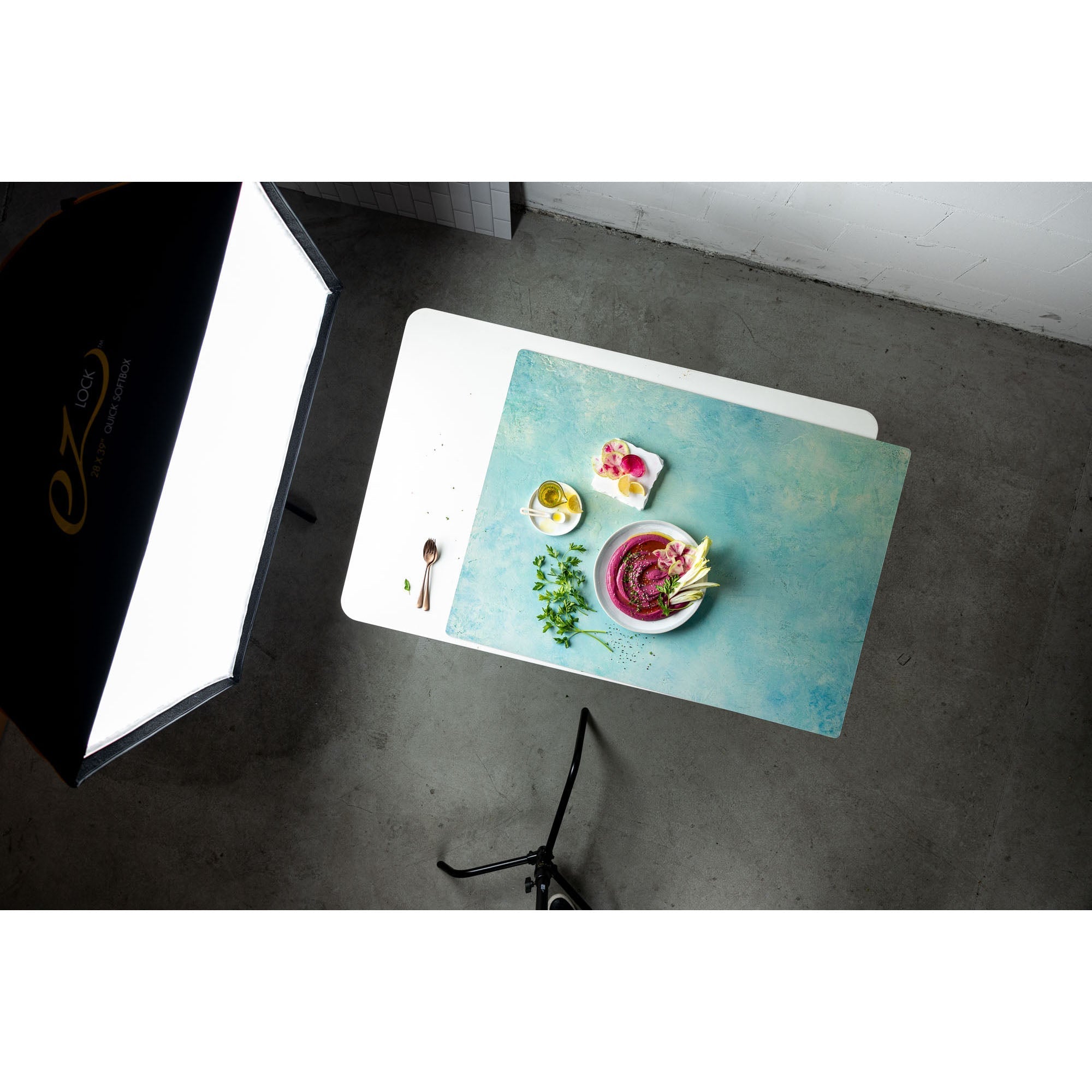 Birds eye view of the V-Flat Miami Sky/Sahara Sand - XL Duo Board being used in a studio.