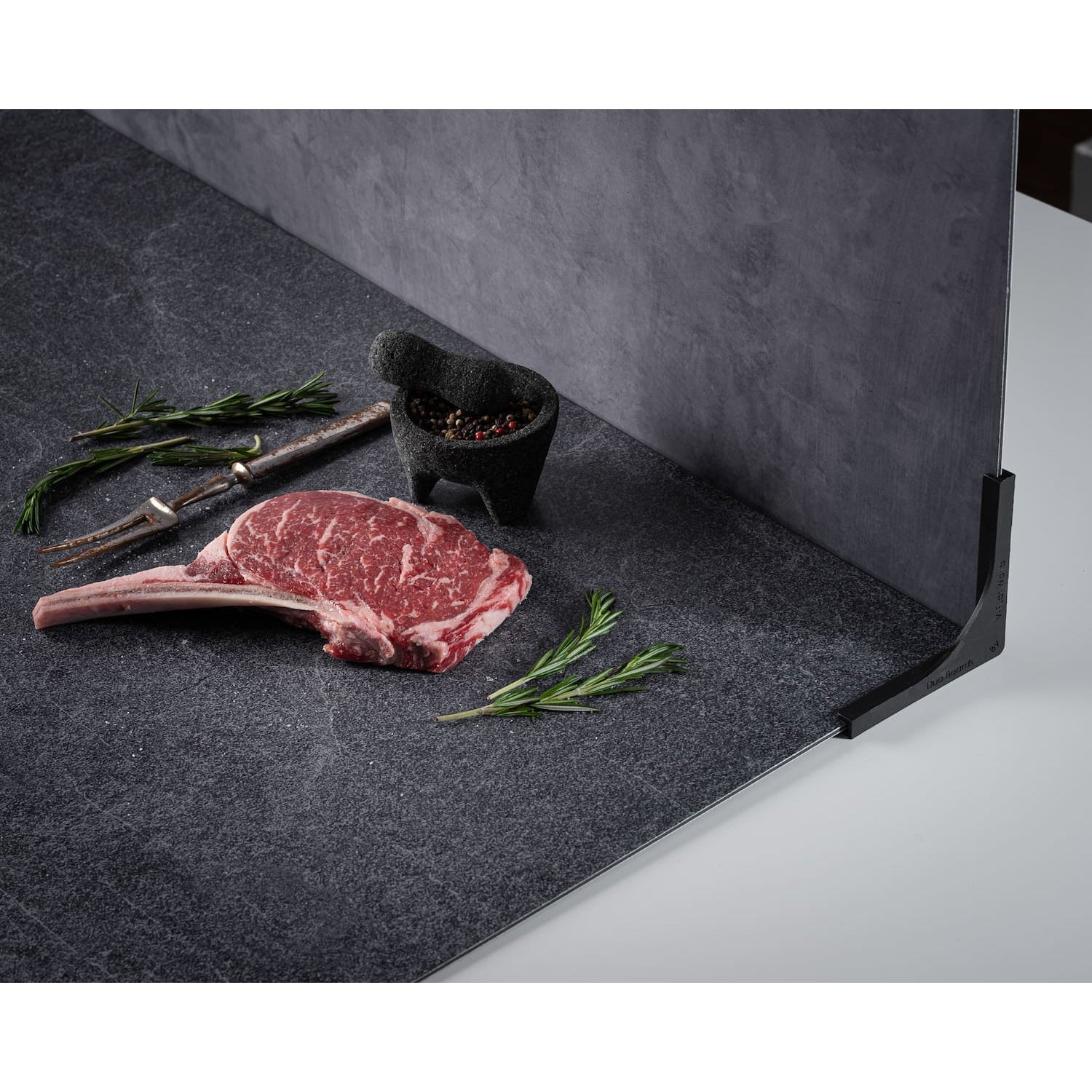 V-Flat Ocean Slate/Black Slate Duo Board with steak as the subject.