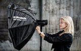 Profoto B10X Plus being fitted with an OCF Softbox