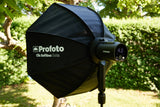 The Profoto A2 outdoors on a lighting stand with the Clic Softbox Octa attached