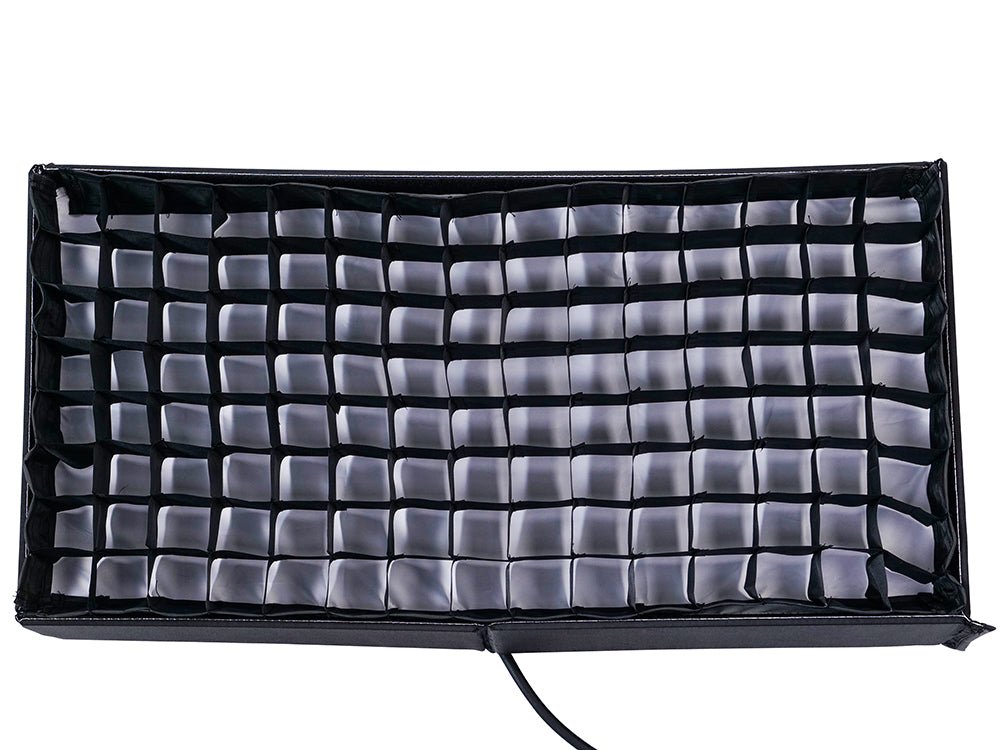 Honeycomb grid attached to Amaran F21x LED Panel on a white background.