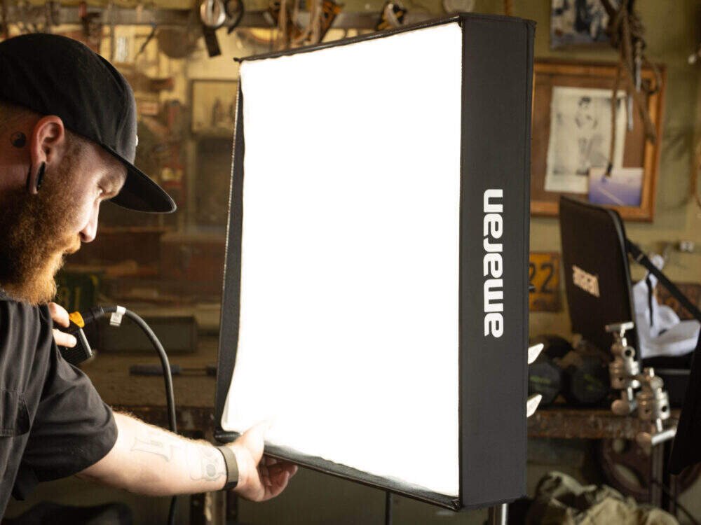 Photographer altering a Amaran F22x LED Panel.