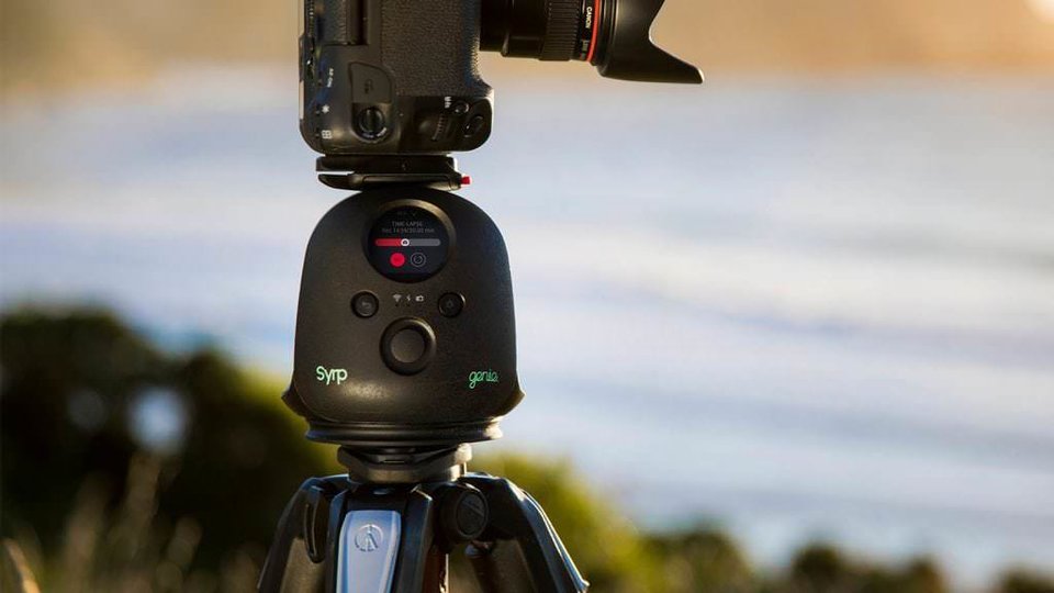 Outdoor photo of the Manfrotto Syrp Genie II Pan Tilt set up on a tripod