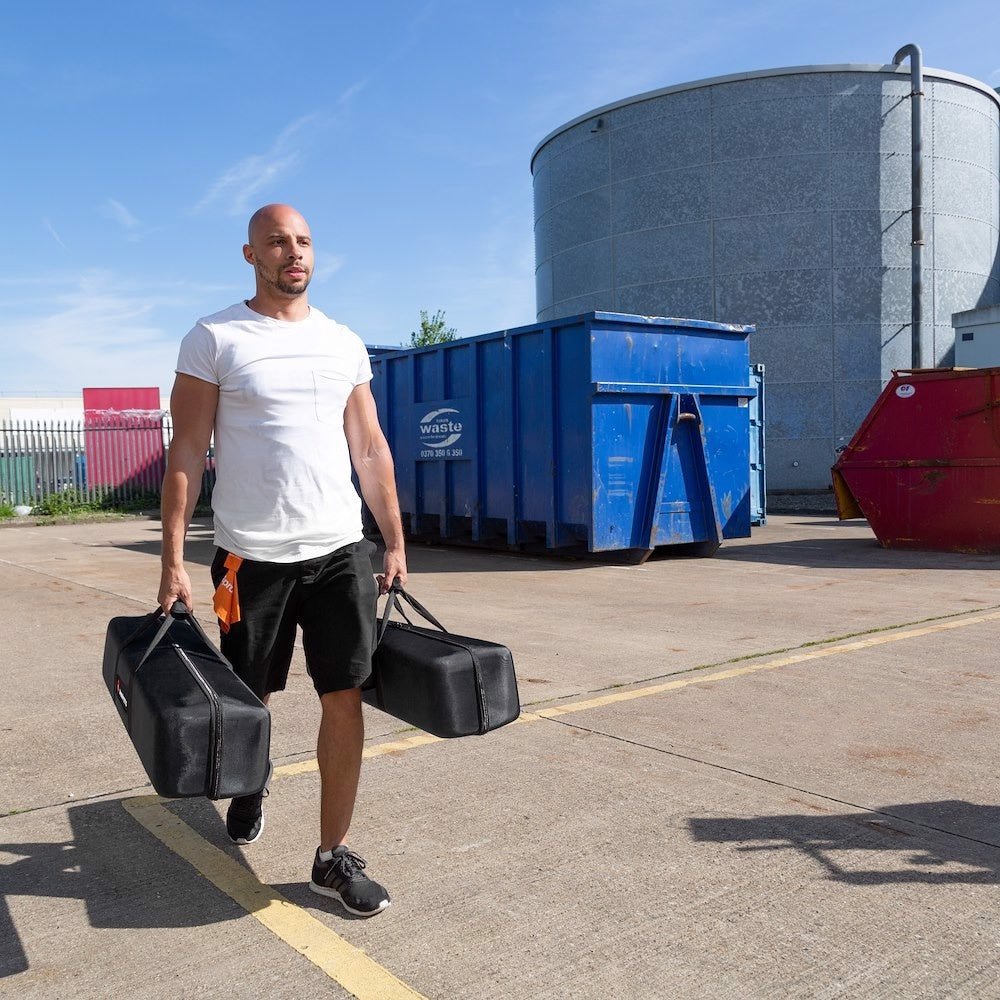 Person Carrying Two  Lastolite StudioLink Chroma Key Screen Kits