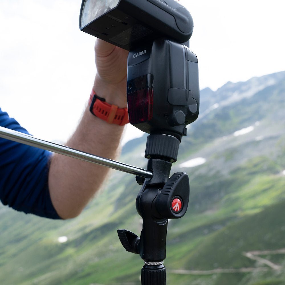 Manfrotto Cold Shoe Tilt Head with flash and umbrella attahched