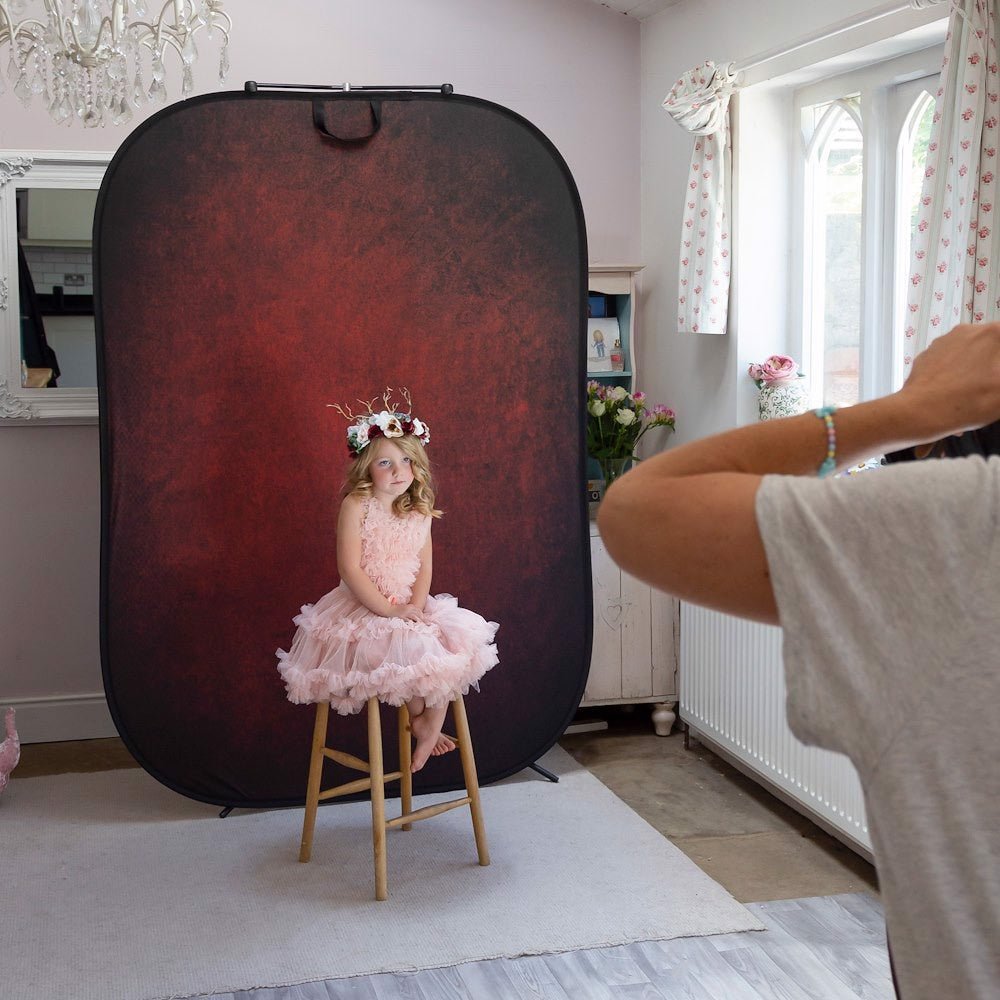Manfrotto Lastolite Vintage Collapsible 1.5 x 2.1m Aubergine/Crimson being used on a photo shoot
