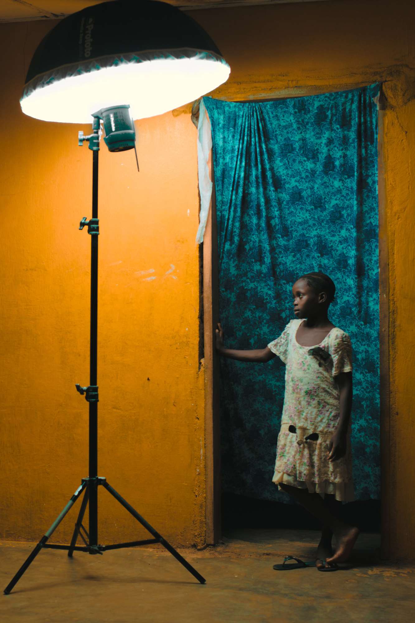 Umbrella with a diffuser being used on a location shoot