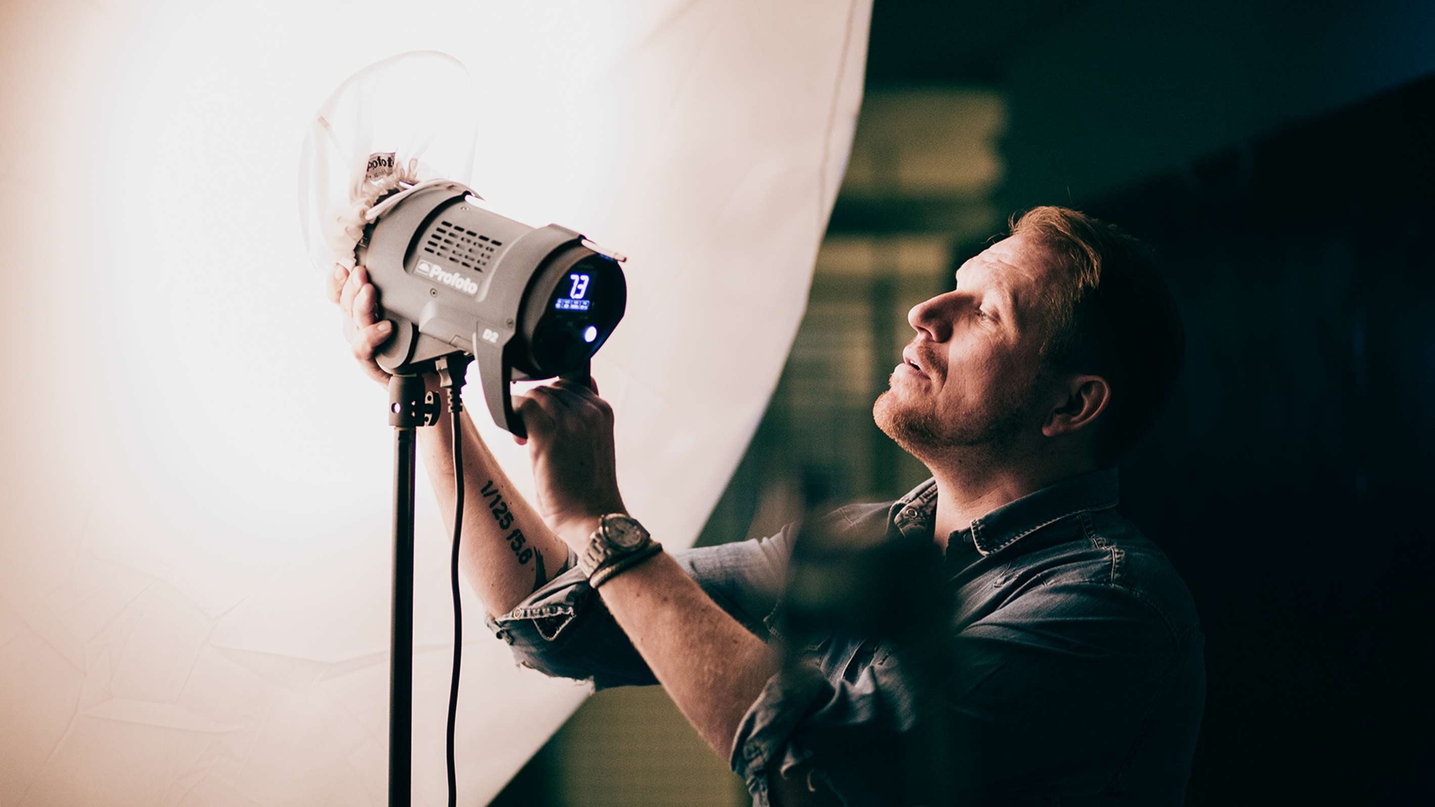 Optional Profoto Umbrella Medium Diffuser being set up for a shoot